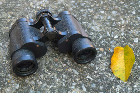 Classic Metallic Black Binoculars or Field Glasses Used for Viewing Distant or Far Away Objects.の写真素材