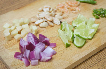 Vegetable and Herb, Chopped Lime, Chili Pepper, Ginger and Groundnut, Dried Shrimp Used for Seasoning in Cooking.の写真素材