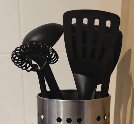 Kitchen Equipment, Set of Flippers and Ladles in Metal Bucket, Kitchen Utensil for Frying and Cooking Meal.の写真素材