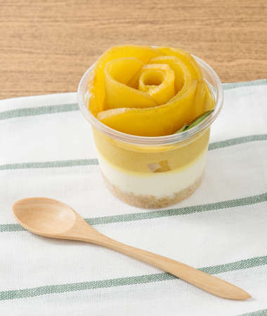 Sweet Food and Dessert, Mango Cheesecake Made of Cream Cheese, Biscuits Crust or Cookies Crust and Ripe Mango.の写真素材