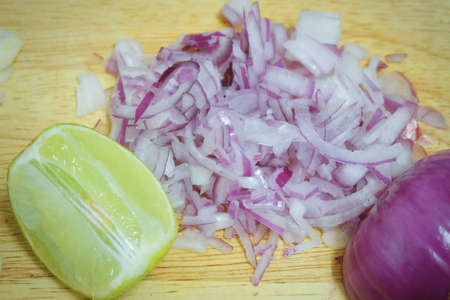 Vegetable and Herb, Chopped Fresh Red Onions and Slice Lime Used for Seasoning in Cooking.の写真素材