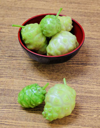 Vegetable and Herb, Fresh Noni, Morinda Citrifolia, Great Morinda, Indian Mulberry, Beach Mulberry or Cheese Fruits with Polysaccharide, Vitamin A, C and Calcium. The Essential Nutrient for Life.の写真素材