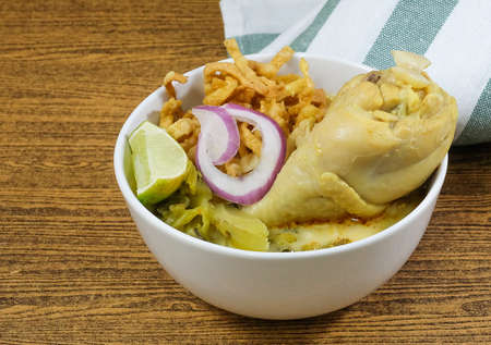 Thai Cuisine and Food, Khao Soi Gai or Traditional Northern Style Curried and Coconut Milk Noodle Soup with Chicken.の写真素材