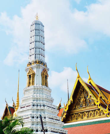 Beautiful Gold Pagodas and Monastery in Wat Phra Kaew Temple and The Grand Palace at Bangkok, Thailand.の写真素材