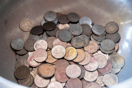 People Donate Money to Make Merit to Buddhist Temple in An Almsbowl, Thailand.