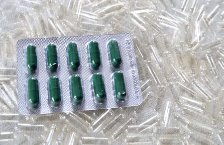 Medical Concept, Blister Pack with Medical Pills on The Pile of Empty Capsules.の写真素材