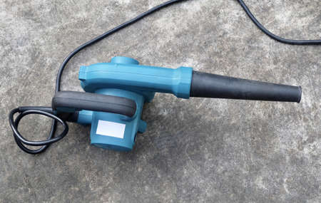 Blue Air Blower on Cement Floor, Use to Remove Dust From The Electrical Machine and Leaves in A Garden.の写真素材