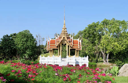Thai Pavilion or Gazebo with Pink Cosmos Flowers, A Garden Outbuildings in Suan Luang Rama 9 in Bangkok, Thailand.の写真素材