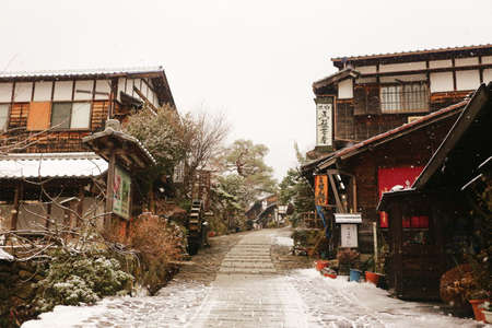 Ancient town is covered with snow.