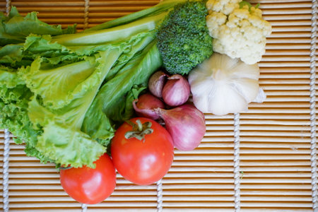 vegetables on a bamboo tablecloth. Vegetables on a bamboo tableclothの写真素材