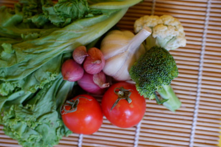 vegetables on a bamboo tablecloth, close-up.の写真素材