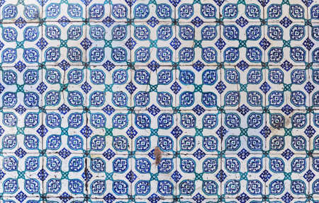 several ancient oriental ceramic tiles on a wall of mosque, rustem pasha, in istanbul, turkey.