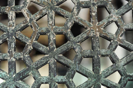 Fine detail of an old wrouth iron fence in SultanAhmet Mosque (Blue Mosque) in Istanbul, Turkey.の写真素材