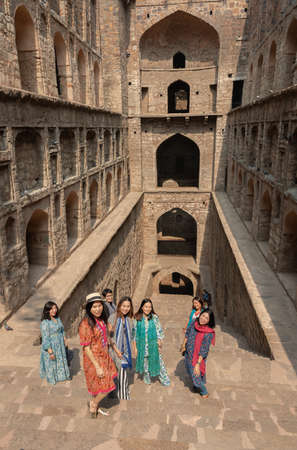 October 13,2019.  Foreigners Enjoying Photoshoot at the Ancient structure of Agrasen ki Baoli,a wide historical step well on Hailey Road, near Connaught Place,Jantar Mantar in New Delhi, India.のeditorial素材