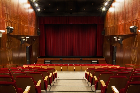 auditorium with red chairs and red curtainのeditorial素材