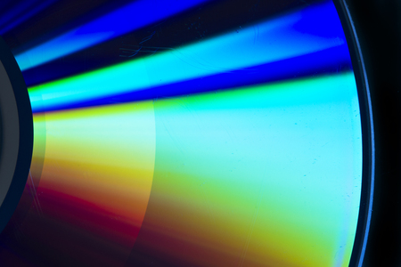 cd-rom rainbow reflection with black backgroundの写真素材