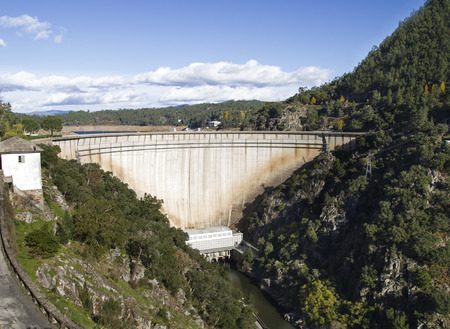 big hydroelectric river dam in the mountainの写真素材