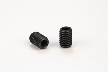Metal bolts and screws on white backgroundの写真素材