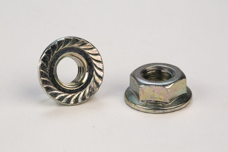 Metal bolts and screws on white backgroundの写真素材