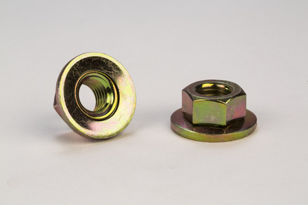 Metal bolts and screws on white backgroundの写真素材