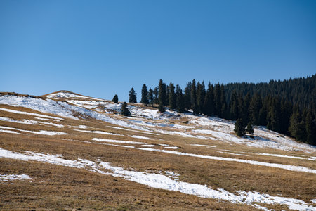 mountain landscape with snow and clear blue skyの写真素材