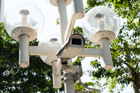 Closed circuit camera on the electric poleの写真素材