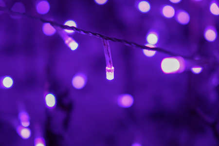 Glowing Christmas lights with blur bokeh at Illumination festival. Defocusedの写真素材