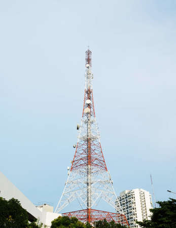 Telecommunication tower with blue skyの写真素材