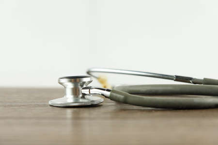 Stethoscope on wooden table background. medical health conceptの写真素材