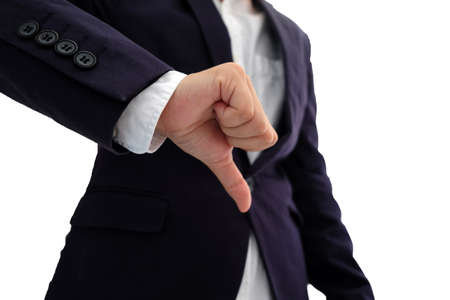 Businessman showing thumbs downï¿½isolated on white backgroundの写真素材