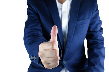Businessman showing thumbs upÂ isolated on white backgroundの写真素材