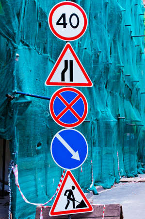 signs against the building structuresの写真素材