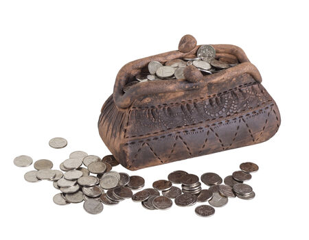 souvenir purse of clay with coins on white background  savingの写真素材