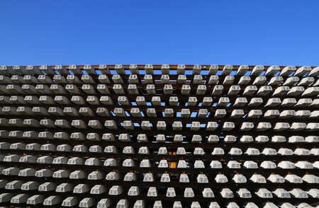 assembled rails and sleepers made of metal and concrete storage under the sky