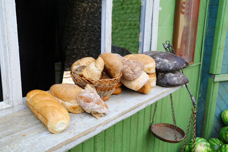 fragment of the old shop for sale of bread and pastries with weights