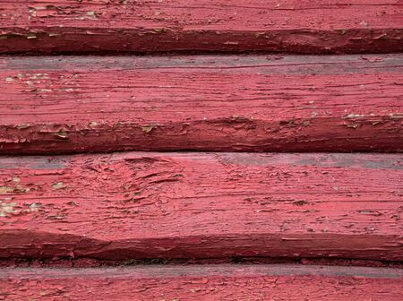 fragment of wooden wall texture, background, color redの写真素材