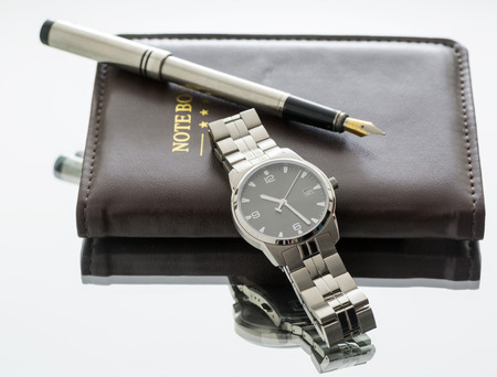 still life. wristwatches metal handle. Notepad. close-up. Macro.の写真素材