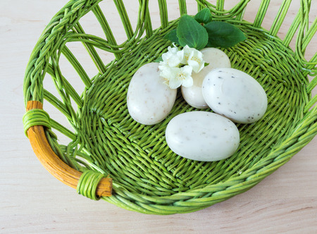 still life. green basket, soap and jasmine flower. close-up. fragmentの写真素材