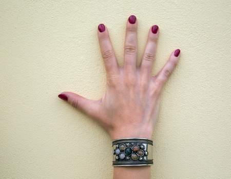 jewelry bracelet women on an old wooden surface, modern fashion, charms, jewelry, macroの写真素材