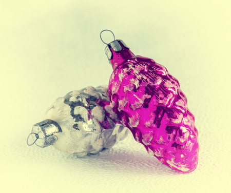 Old-fashioned Christmas tree decorations: cones, glassの写真素材