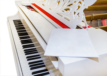 white piano classical musical instrument, notes, fragmentの写真素材