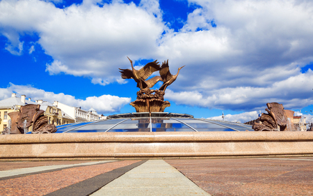 Minsk, Belarus: August 25, 2016: Three storks sculpture in the fountain in Independence Squareのeditorial素材