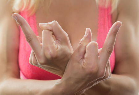 Young sexy woman, close-up showing middle finger.のeditorial素材