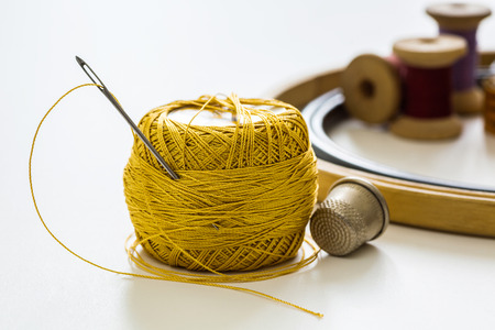 Creative image of sewing accessories for needlework and sewing, hobby, on white backgroundの写真素材