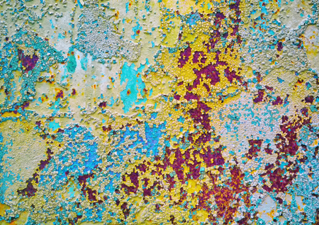 Old painted wall background. cracked, scratched against the old wall background. creative imagery