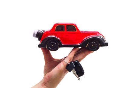 Hand hold the model car, Christmas tree, holiday gift. Christmas holiday concept. Card. Free space...