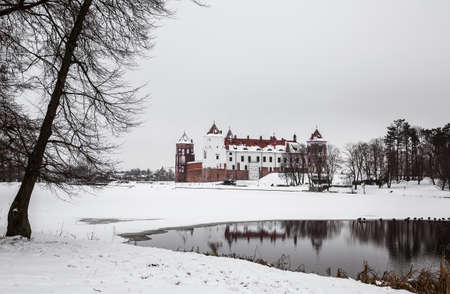 Belarusian attraction Mir Castle covered with snow in the winter season.のeditorial素材