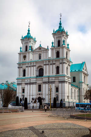 Grodno, Belarus, 04/17/2021, Church of St. Francis Xavier, Sovetskaya Square, Catholic Church against the sky, editionのeditorial素材