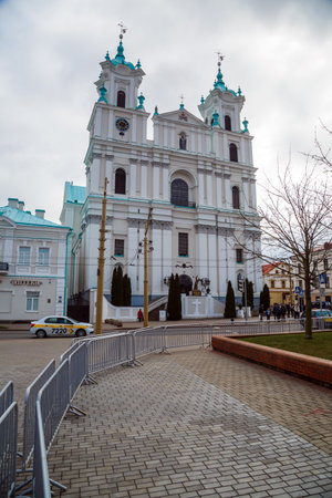 Grodno, Belarus, 04/17/2021, Church of St. Francis Xavier, Sovetskaya Square, Catholic Church against the sky, editionのeditorial素材