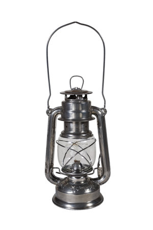 Old kerosene lamp isolated on white background. Antique metal lantern with hanging hook. GDR productionの写真素材